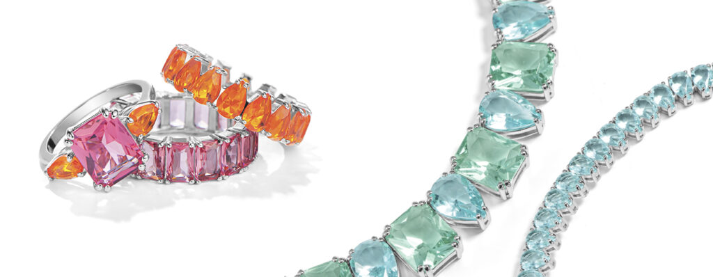 na imagem, está os colares verde e azul e rosa e laranja da coleção Royal por life by Vivara, em cristais coloridos e um fundo claro